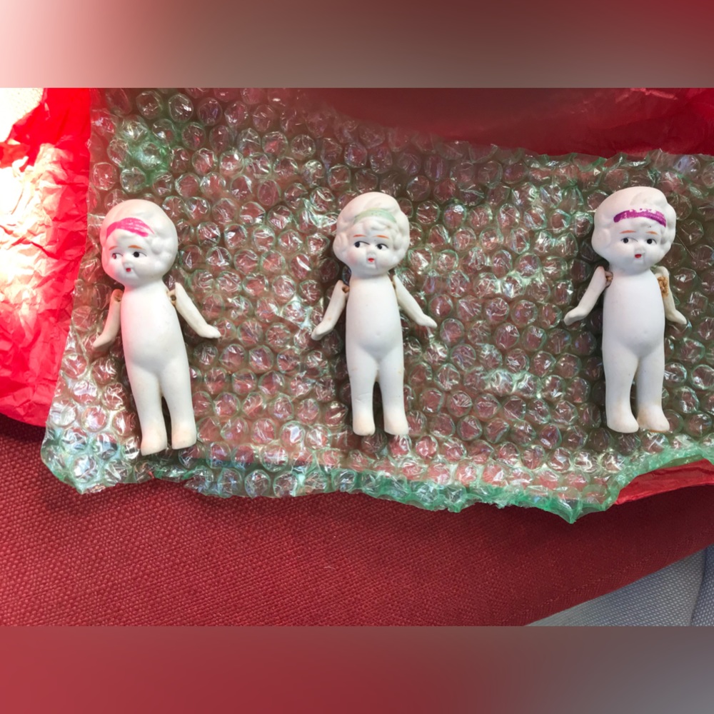 Three miniature bisque dolls